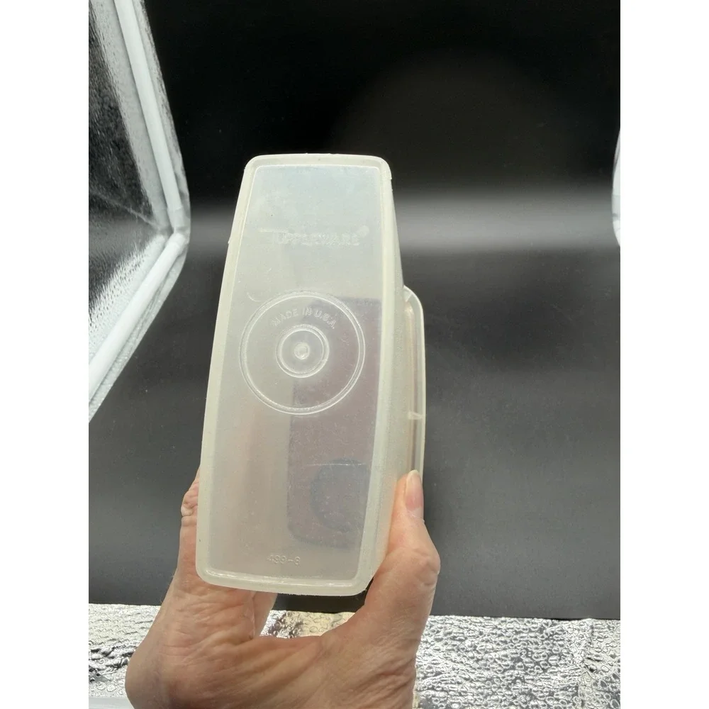 Vintage Mini Cereal Tupperware Container Bottom is 499-8 and‎ Top is 509-10.